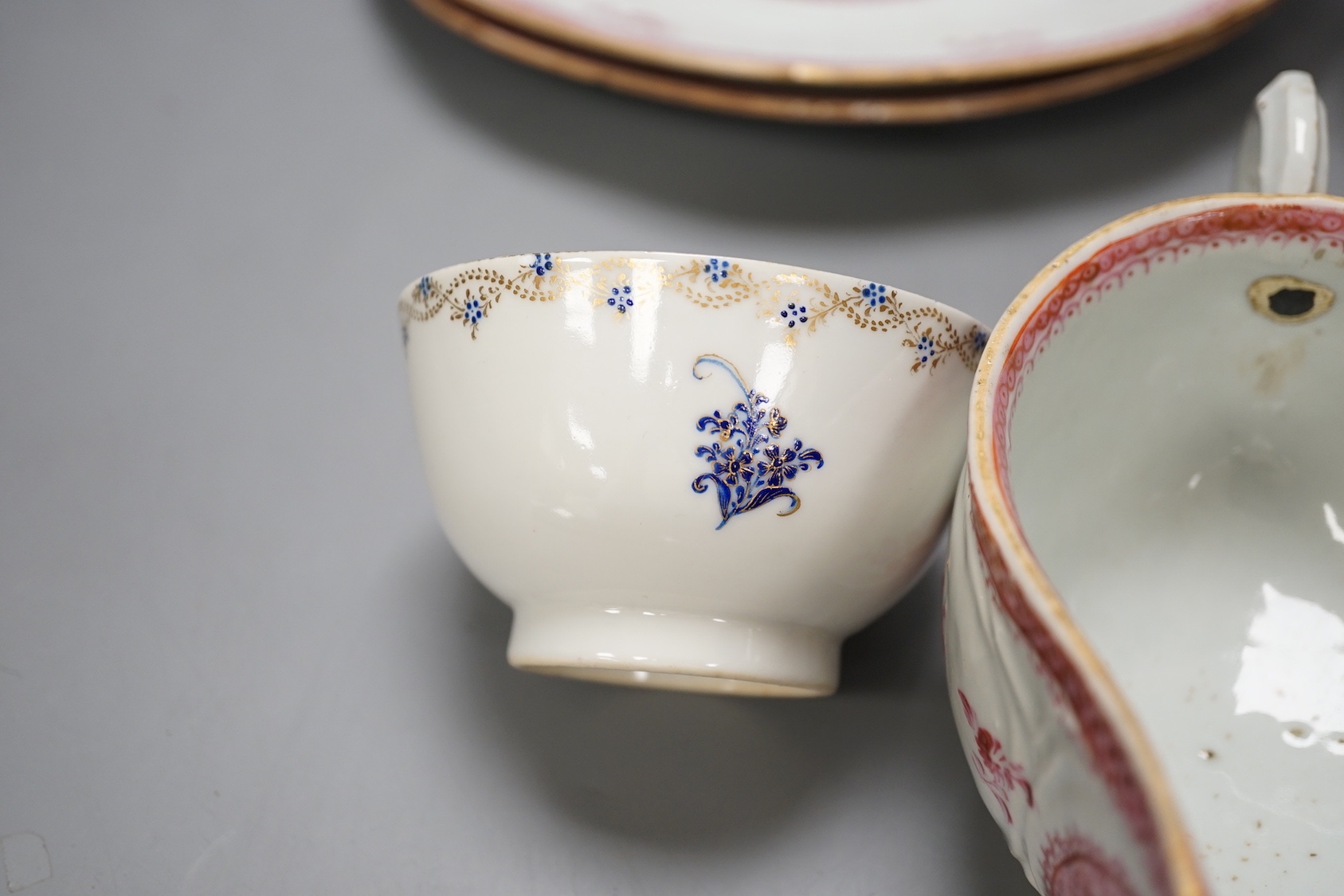 A group of 18th century chinese export: two plates, two sauceboats, a bowl and a tea bowl